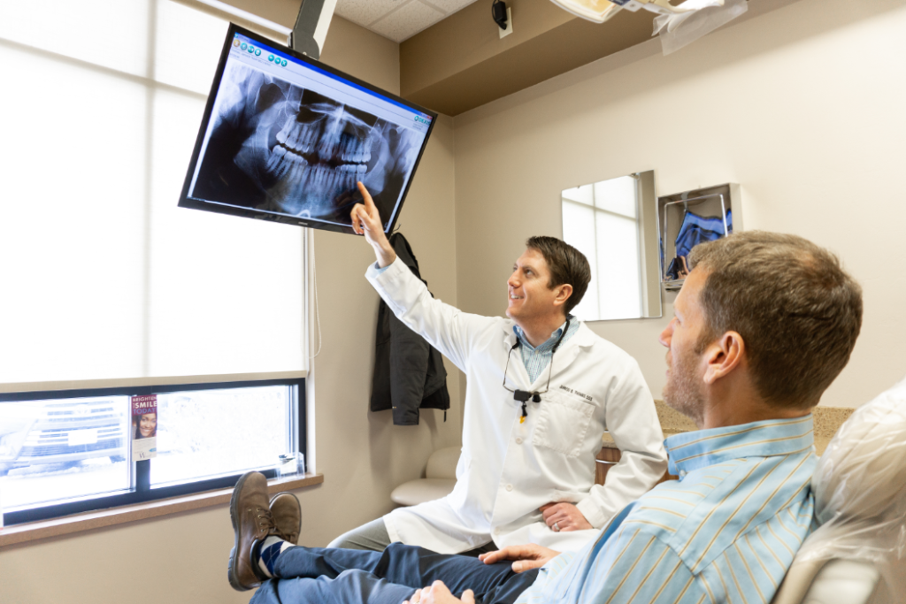 doctor reviewing xrays with patient