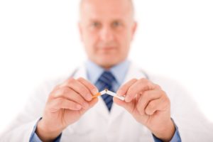 Doctor breaks  cigarette to quit smoking