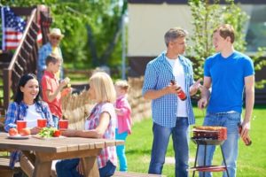 young men frying brat and talking at cook out