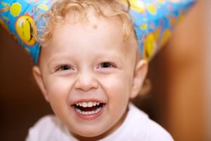 laughing little boy with nice teeth